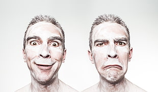 man with powder on face doing wacky face
