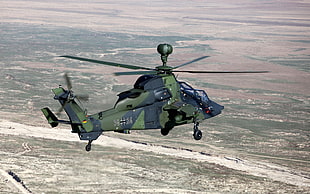green and gray military Helicopter