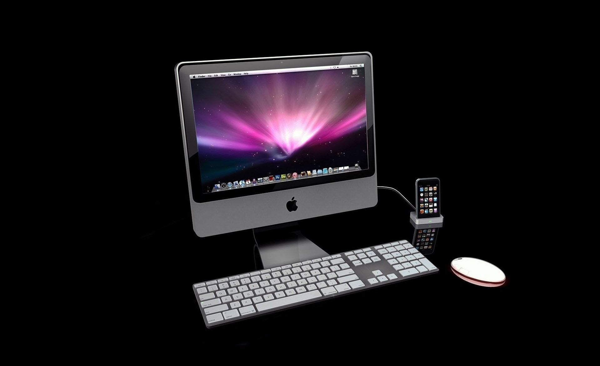 silver iMac with wireless Apple computer keyboard and mighty mouse