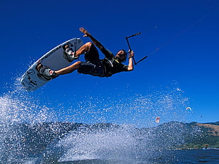 time lapse photography of man wakeboarding HD wallpaper