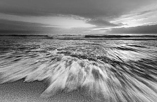 grayscale timelapse photography of seashore