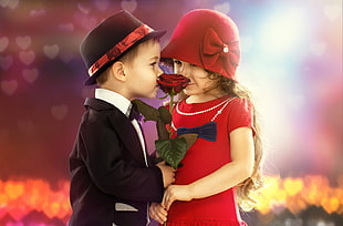 boy and a girl wearing formal suit and dress with rose at the center HD wallpaper