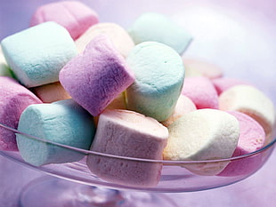 assorted color marshmallows on glass bowl