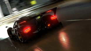 black hyper car on road during night time