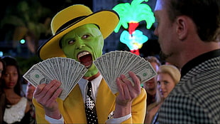 Joker holding fan of U.S. dollar bill lot