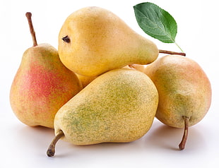 several peach fruits against white background