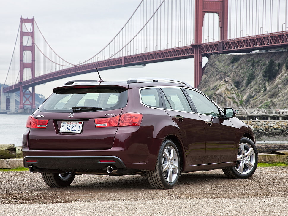 maroon Acura station wagon parked near golden gate bridge during daytime HD wallpaper