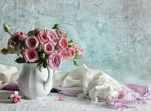 pink rose bouquet in white ceramic vase