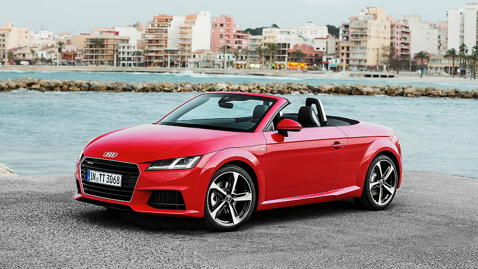 red Audi convertible coupe HD wallpaper