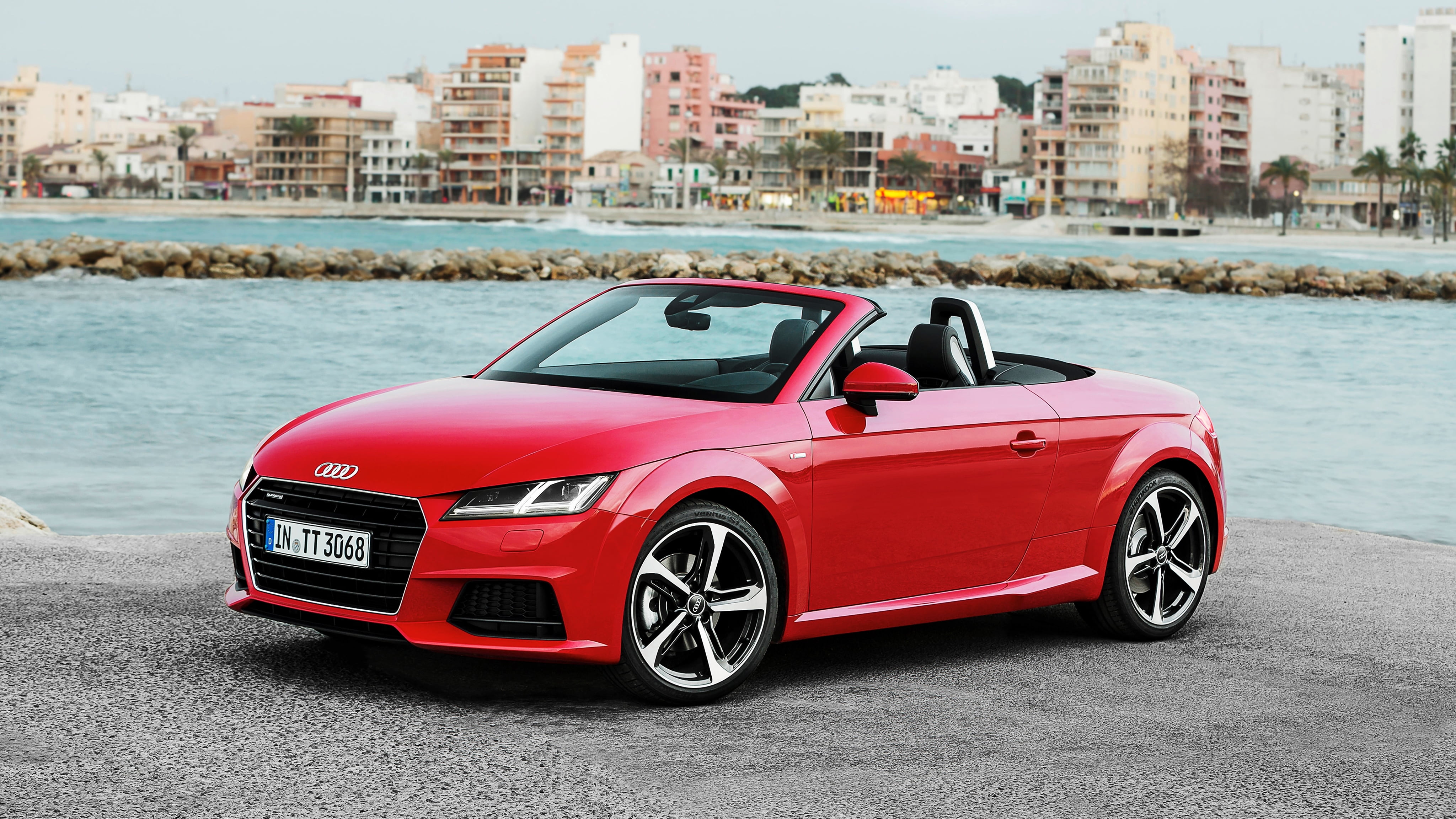 red Audi convertible coupe