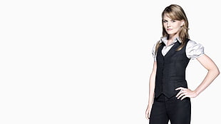 woman wearing black vest