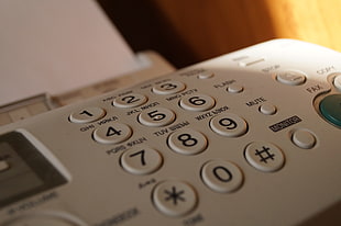 closeup photo of white fax machine