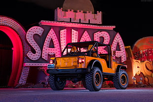 orange Willy's jeep near Sahara signage