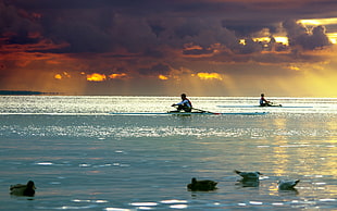two man riding a boat during sunset, lake geneva HD wallpaper