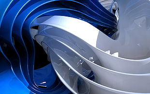 white and blue ceramic spiral frames