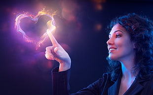 woman touching fire forming heart illustration HD wallpaper