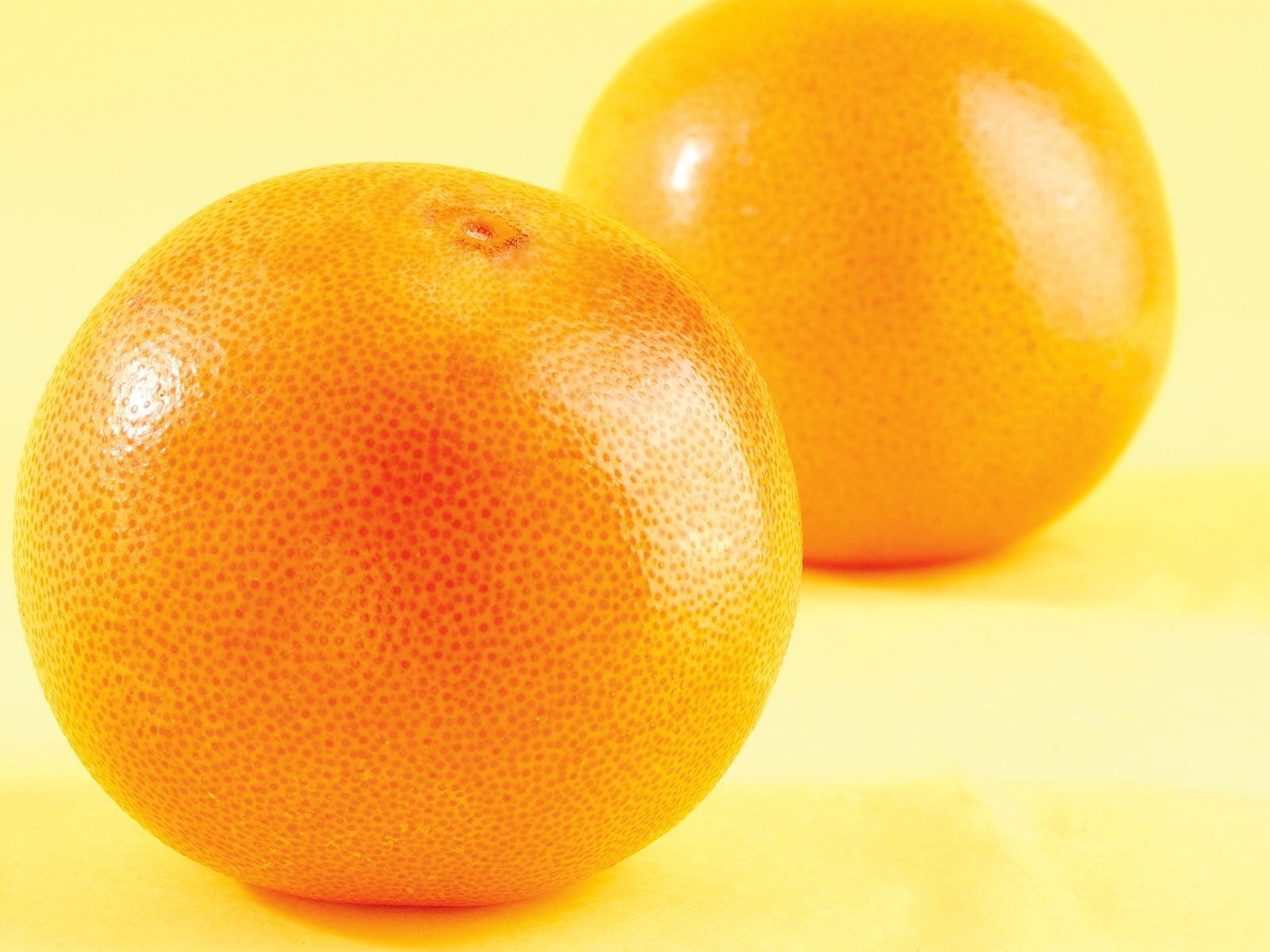 two round orange fruits