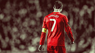 Cristiano Ronaldo wearing red jersey standing