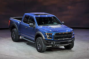 blue Ford F-150 Raptor extra cab pickup truck
