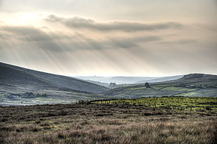 photo of sunrays on village
