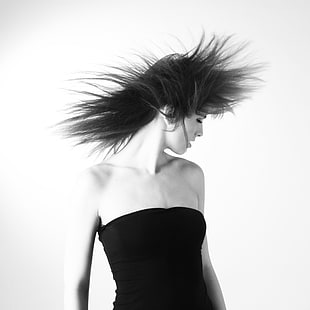 photography of woman waving her hair