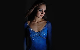 woman in blue glitter top