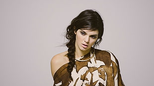 woman wearing brown floral top