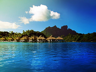 Tiki Hut over body of water