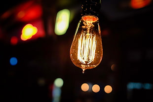 selective focus photography of turned on bulb