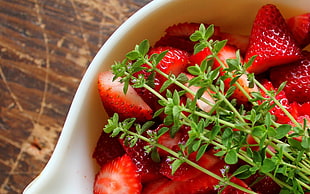 strawberries in a white ceramic bowl