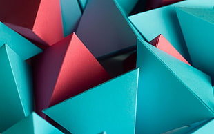 teal and red pyramid boxes digital wallpaper