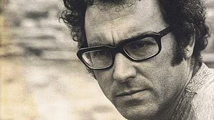 man wearing black frame eyeglasses
