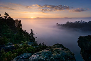 view top of the mountains with fogs and sunrise HD wallpaper