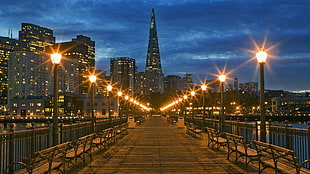 brown wooden bridge, cityscape, city, lantern, night
