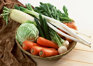 vegetables on brown wicker bowl