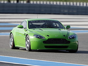 green Aston Martin coupe