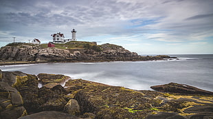 lighthouse near sea HD wallpaper