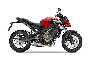 red and black sports bike with white background