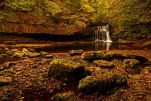 time lapse photography of waterfalls