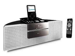 gray and black iPod dock speaker with remote illustration