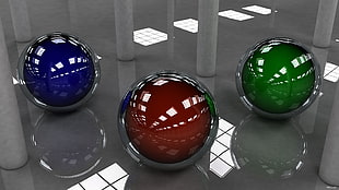three blue, red, and green balls digital wallpaper