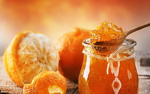 orange marmalade on clear glass container