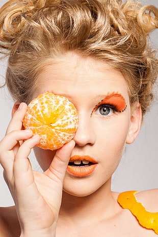 woman holding Orange fruit HD wallpaper