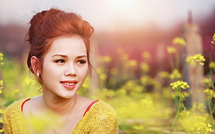 woman in yellow blouse beside rapeseed flower field HD wallpaper