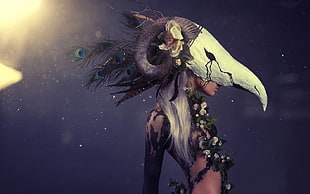 female wearing animal skullhead skeleton and floral costume digital wallpaper