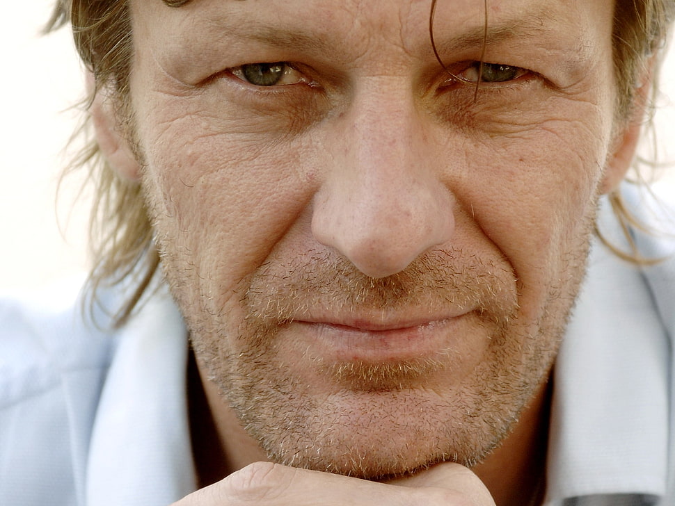 man's face close-up photography HD wallpaper
