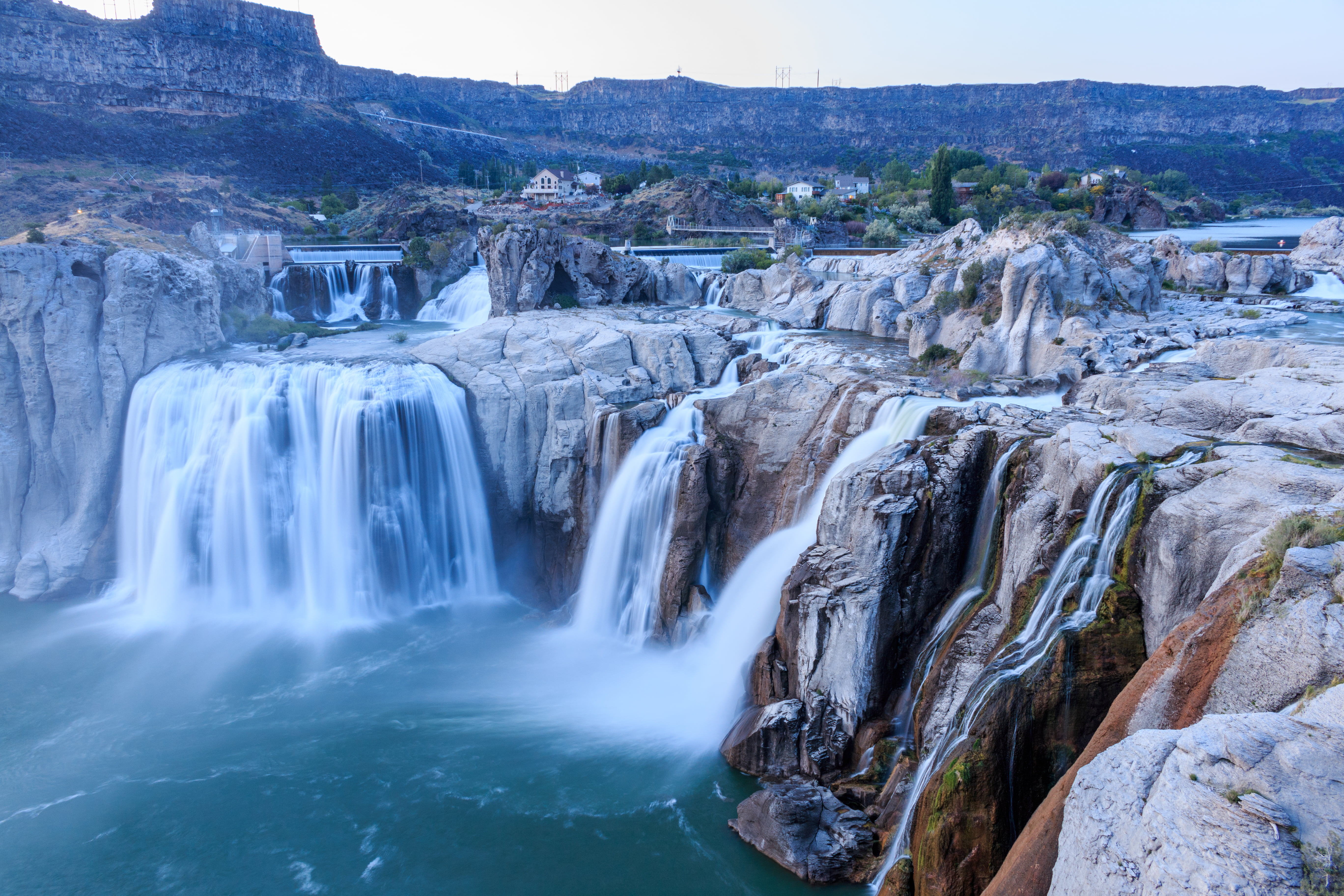 landscape photography of mountain near water falls