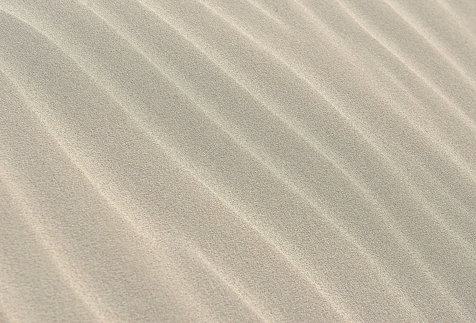 close up photo of white sand HD wallpaper