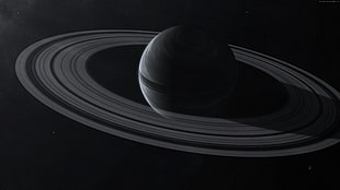 grey scale photo of Saturn planet