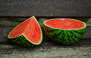 half sliced watermelon on wooden panel HD wallpaper